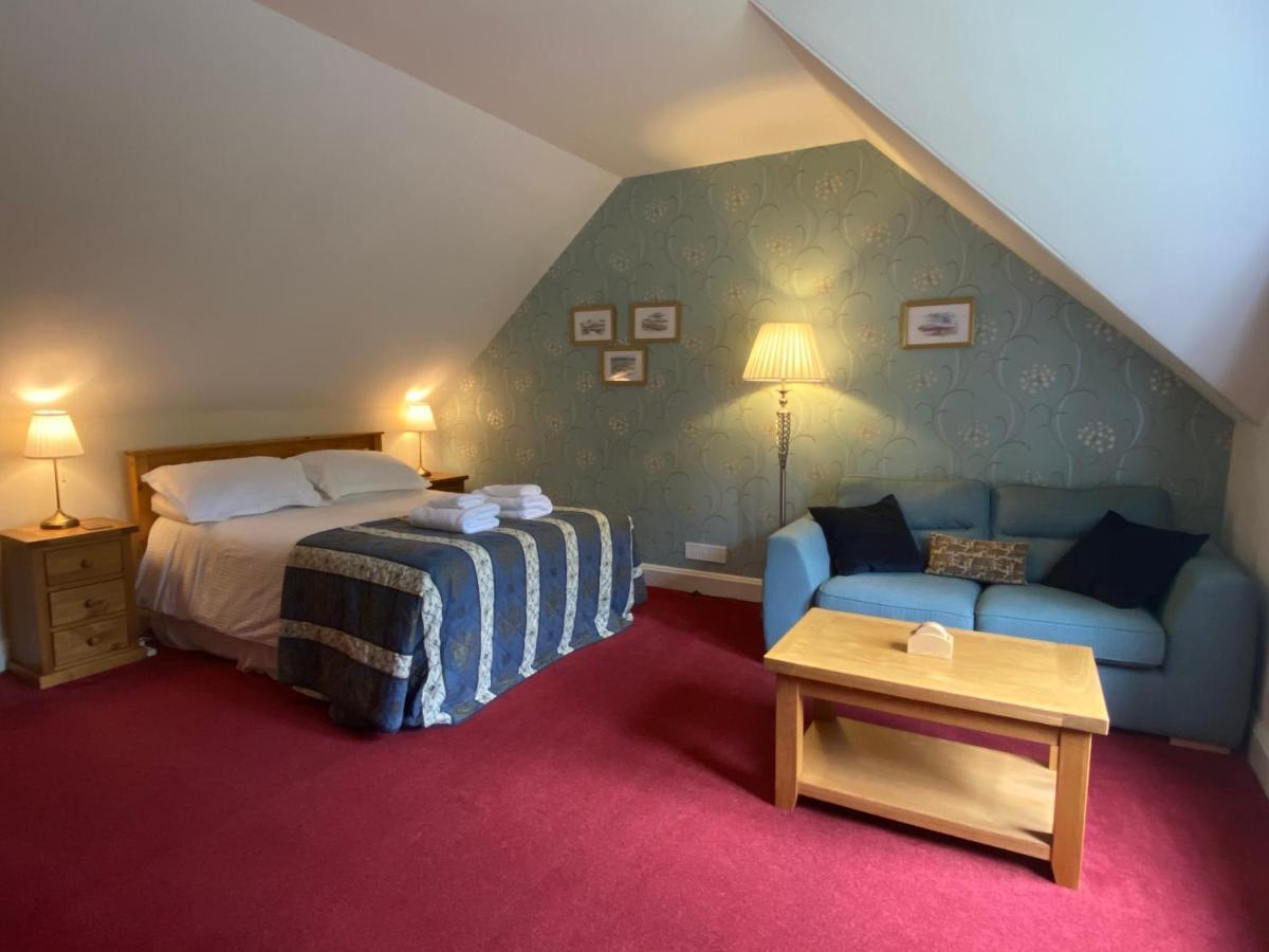 Glenan Lodge Self Catering Tomatin ภายนอก รูปภาพ