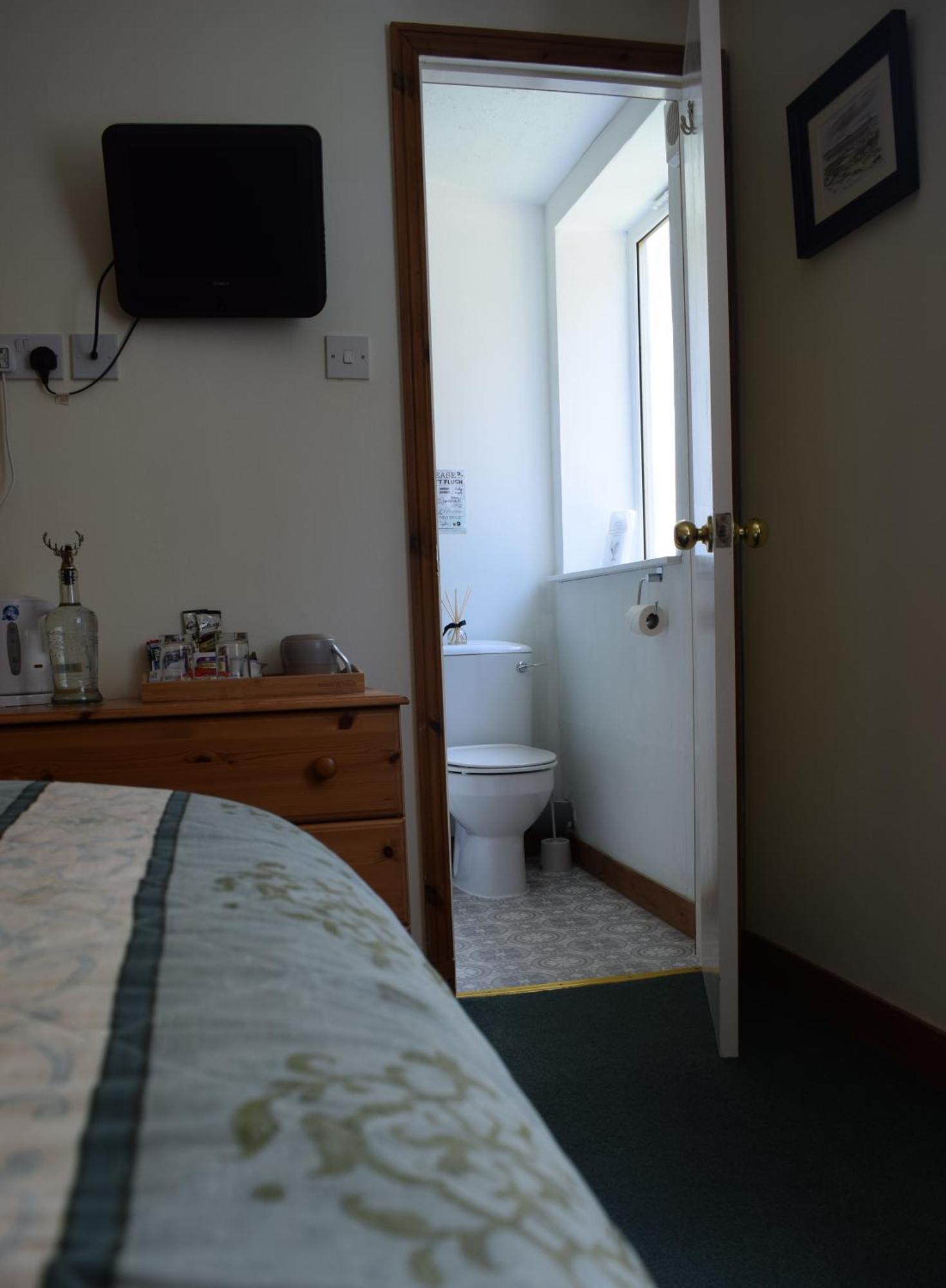 Glenan Lodge Self Catering Tomatin ภายนอก รูปภาพ