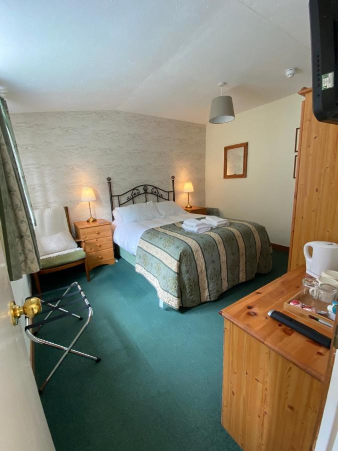 Glenan Lodge Self Catering Tomatin ภายนอก รูปภาพ