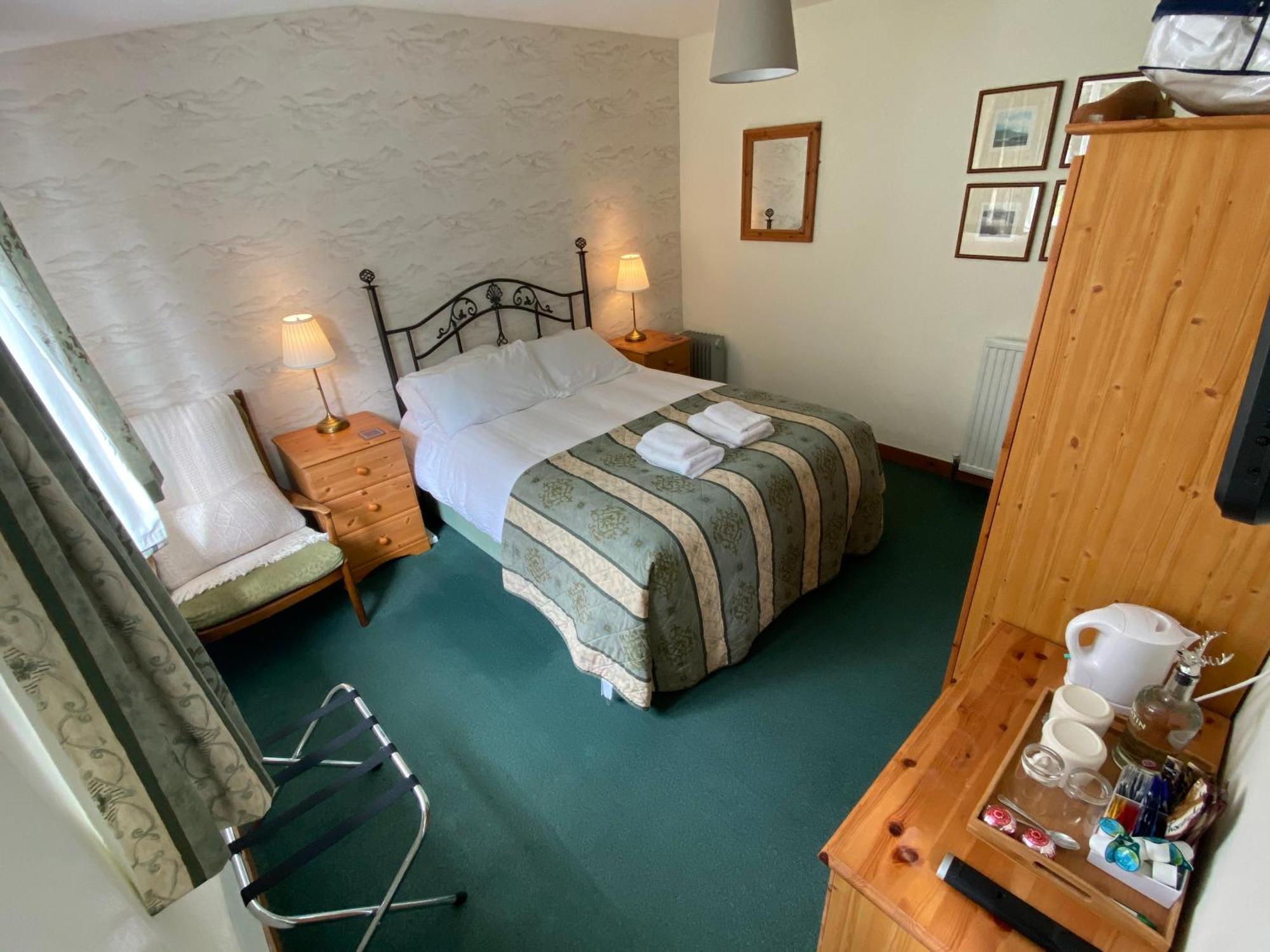 Glenan Lodge Self Catering Tomatin ภายนอก รูปภาพ